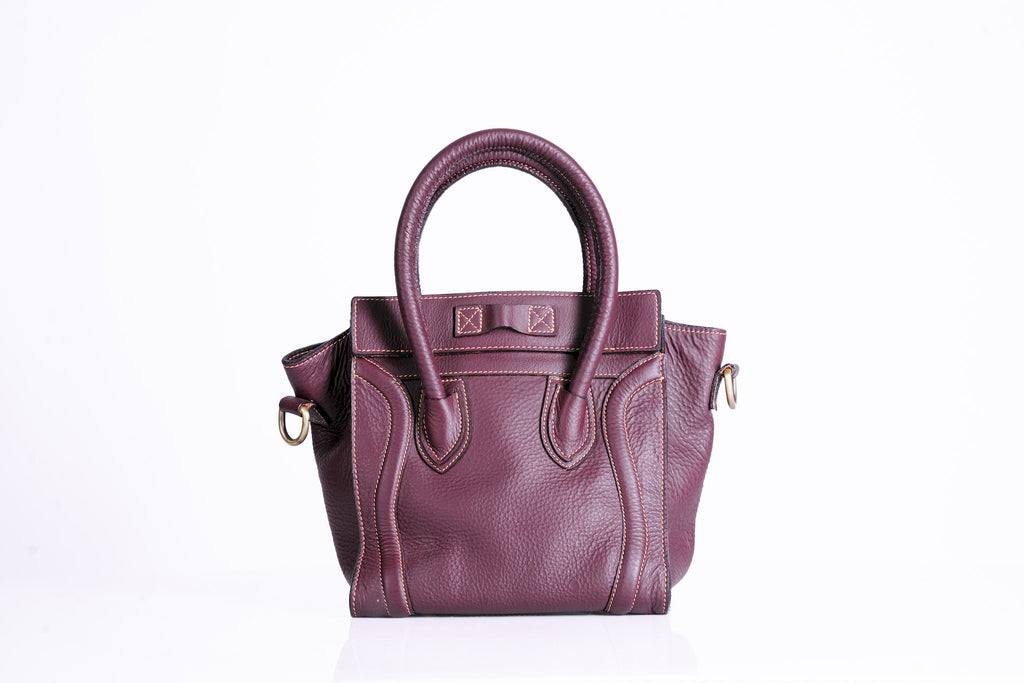 Structured Pebbled Leather Tote with hooped handles and shoulder strap